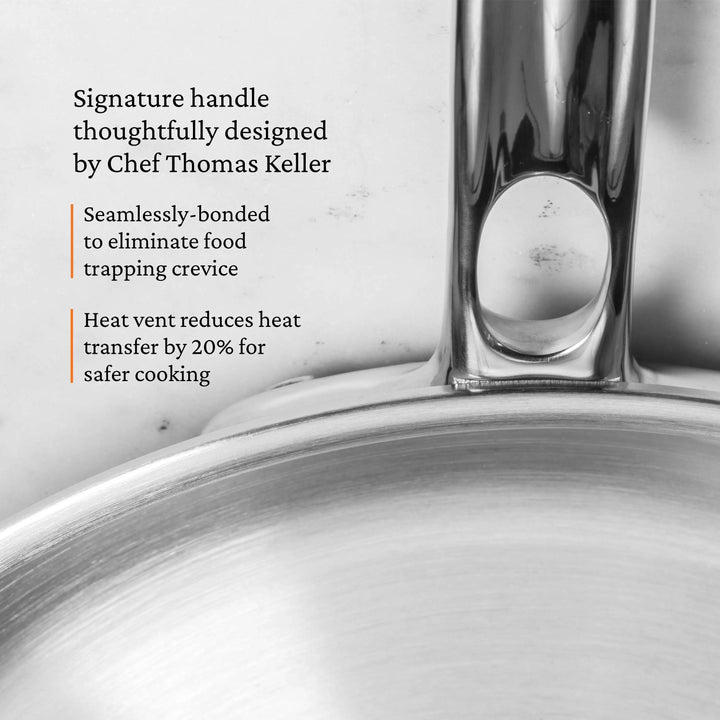 Close-up of a pot handle with text about Chef Thomas Keller's design and features.